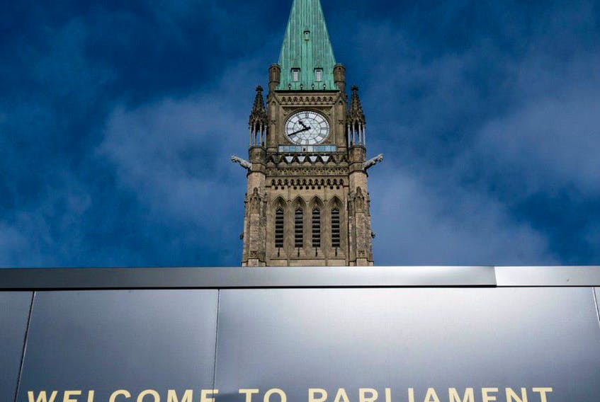  The Peace tower is seen above a welcome sign as politicians began returning to work earlier this month in Ottawa. THE CANADIAN PRESS/Adrian Wyld