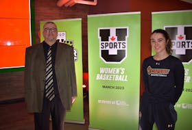 Fabian McKenzie, left, and MacKenzee Ryan are members of the Cape Breton Capers women’s basketball program and were in attendance for the announcement that Cape Breton University will host the U Sports Women’s Basketball Championships in March 2023. JEREMY FRASER • CAPE BRETON POST