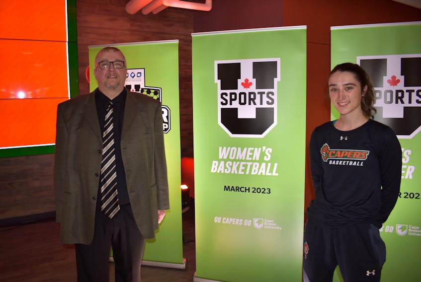 Fabian McKenzie, left, and MacKenzee Ryan are members of the Cape Breton Capers women’s basketball program and were in attendance for the announcement that Cape Breton University will host the U Sports Women’s Basketball Championships in March 2023. JEREMY FRASER • CAPE BRETON POST