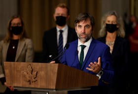 Steven Guilbeault, the new federal minister of environment and climate change, speaks during a news conference after the swearing-in of the new cabinet in Ottawa, on Tuesday, Oct. 26, 2021.