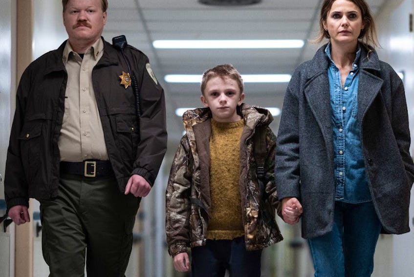 From left, Jesse Plemons, Jeremy T. Thomas and Keri Russell in Antlers.