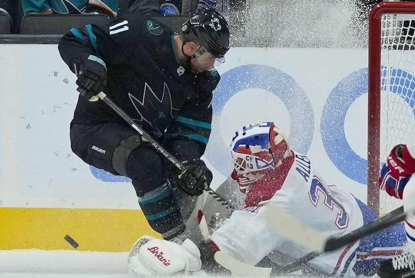 Canadiens goaltender Jake Allen stymies Sharks centre Andrew Cogliano during the second period Thursday night in San Jose.