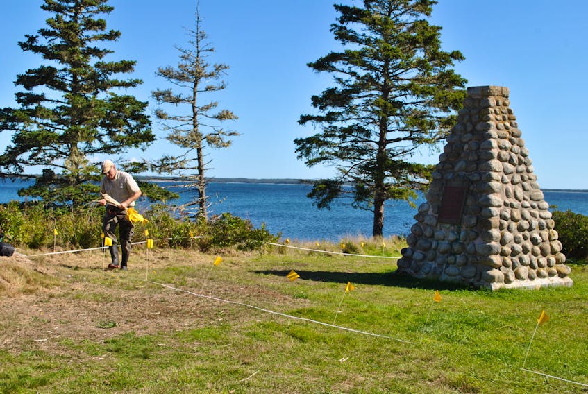 Dr. Jonathan Fowler from Saint Mary’s University sets out grid markers for a ground penetrating radar (GPR) survey near the monument at the Fort St. Louis national historic site in Port LaTour on Sept. 27. The survey was part of the fourth season of archaeological work at the site. KATHY JOHNSON