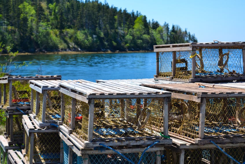 Lobster traps sit on the wharf in St. Peter's. A lobby group representing commercial fisheries has been granted intervenor status in the court case between Potlotek First Nation and the province. ARDELLE REYNOLDS/CAPE BRETON POST