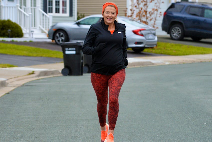 Laura Lawes, eight months pregnant, training for the Tely 10.

Keith Gosse/The Telegram