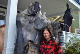 The eight-foot-tall grim reaper towers over its designer and maker, Krista Giddings Campbell, of Charlottetown, who has been working since September transforming her front lawn at 6 Madison Ave. into a Halloween extravaganza. She makes all of the costumes and props from scratch, buying nothing in stores.