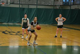 UPEI Panthers' fifth-year centre Carolina Del Santo shoots a foul shot as veteran guards Reese Baxendale, left, and Jenna Mae Ellsworth look on. The Panthers open the 2021-22 Atlantic University Sport regular-season schedule against the visiting Memorial Sea-Hawks on Oct. 30 at 6 p.m.