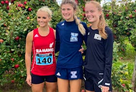 Second-place finisher Jade Roberts of Memorial (left) poses with race winner Siona Chisolm of St. FX and third-place Paige Chisolm of UPEI (right) after the women's race in the Acadia Invitational on Saturday. — Acadia Athletics photo