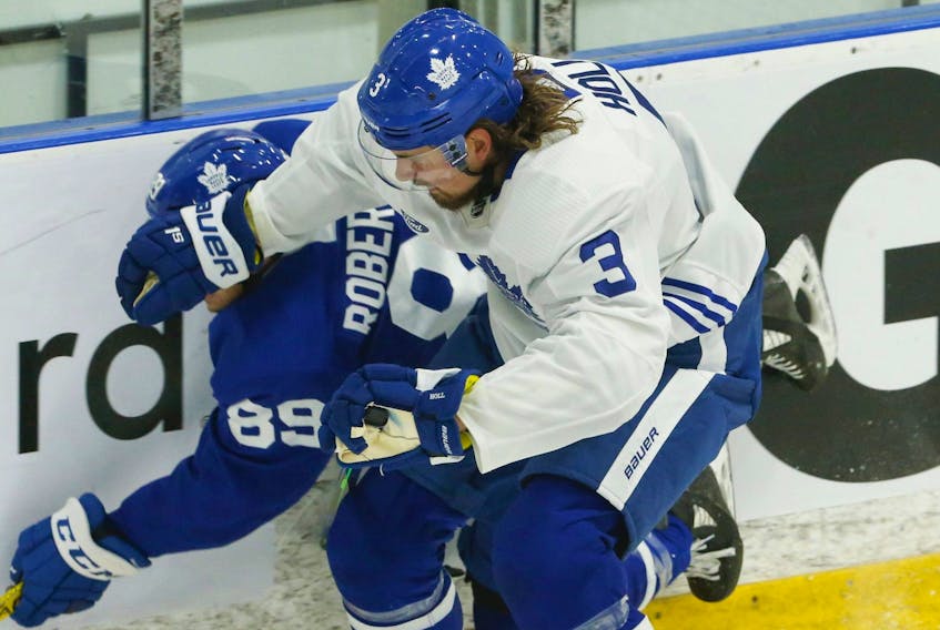 Toronto Maple Leafs defender Justin Holl won't be playing against the Red Wings on Saturday night. 