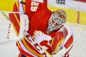 Calgary Flames goaltender Jacob Markstrom makes a save against the Philadelphia Flyers at the Scotiabank Saddledome in Calgary on Saturday, Oct. 30, 2021. 