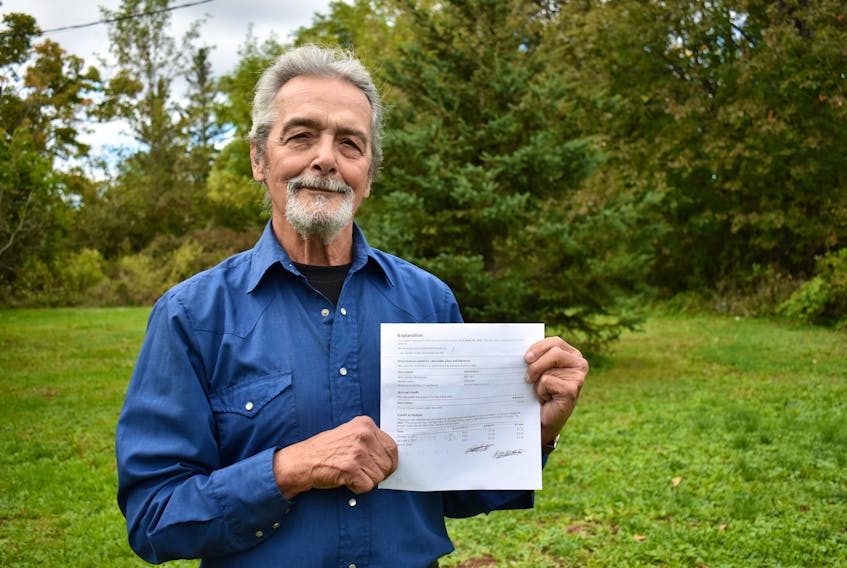 Bedeque resident Ron Melanson holds a letter from the Canada Revenue Agency that told him the federal portion of his GST/HST credit for October, January and April would be $0.00, reducing his income by more than $100. Michael Robar • The Guardian