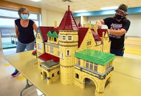 Jason Pyett, owner of Playwell Bricks, shows how he can remove segments of his latest creation at the Musquodoboit Valley Education Centre on Friday, Oct. 4, 2021. The LEGO house is a replica of the Brookside Mansion at the University of Saint Francis in Fort Wayne, Indiana.
Ryan Taplin - The Chronicle Herald