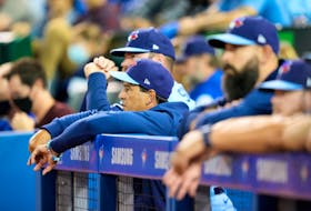 Blue Jays manager Charlie Montoyo looks on as his team plays the Baltimore Orioles in the eighth inning at the Rogers Centre on Sunday, Oct. 3, 2021 in Toronto.