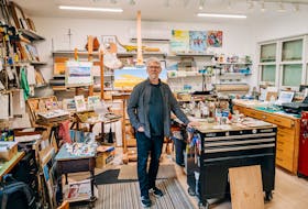 Artist Ron Hayes, shown here in his studio at the ArtCan Gallery and Café in Canning, has been inspiring others to pick up a paintbrush for since opening the business. 
Zack Goldsmith Photography
