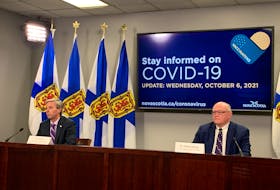 Oct. 6, 2021 - Nova Scotia Premier Tim Houston and Dr. Robert Strang, the province's chief medical officer of health, present a COVID-19 update on Wednesday at One Government Place in Halifax.