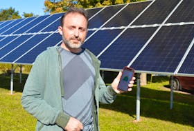 Jeremy Ladan of Charlottetown recently had solar panels installed outside his home through the Switch Charlottetown program to reduce his electric bills. He’s able to measure the amount of energy those panels put out via an app on his smartphone.