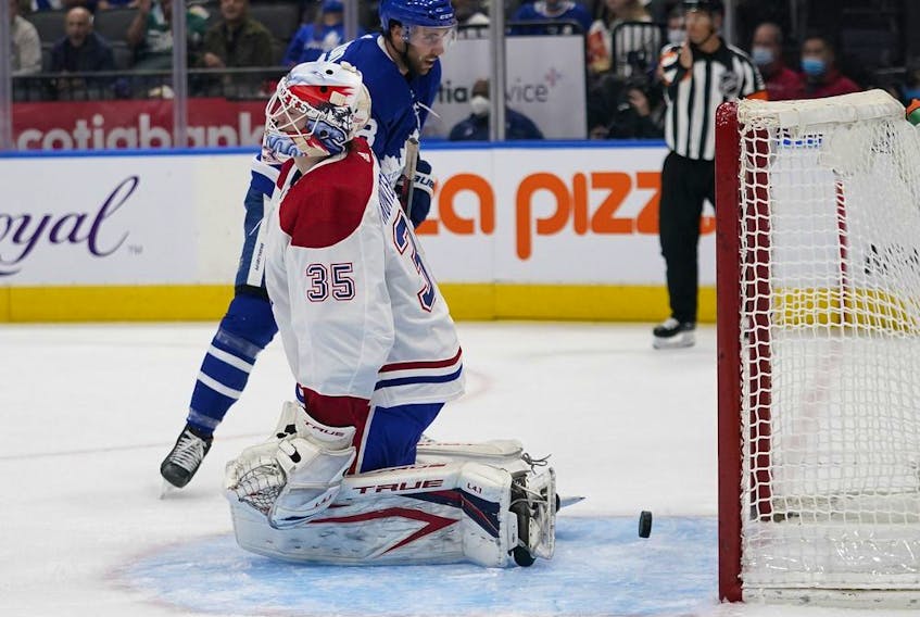 A shot by Maple Leafs forward Nick Ritchie eludes Canadiens goaltender Samuel Montembeault during the first period Tuesday night at Scotiabank Arena in Toronto.