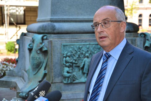 Gary Burrill, leader of the New Democratic Party, speaks to media outside Province House in Halifax on Thursday, Oct. 7, 2021.