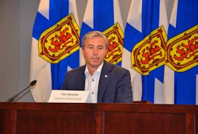 Premier Tim Houston speaks to media after a cabinet meeting Thursday, Oct. 7, 2021, in downtown Halifax.