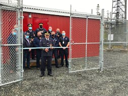 John Davison, Regional Emergency Management Coordinator for Pictou County cuts the ribbon on a new telecommunication tower in the Blue Mountain area.