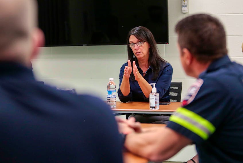 Health and Wellness Minister Michelle Thompson meets with paramedics in Sydney during the Speak Up for Health Care Tour in September, 2021.