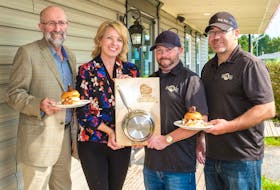 Left to Right: Ron Maynard, president PEI Federation of Agriculture; Melody Dover, president & creative director, Fresh Media; Chef Aaron Ferrill, Holy Cow; Quentin Gillis, Owner, Holy Cow. 