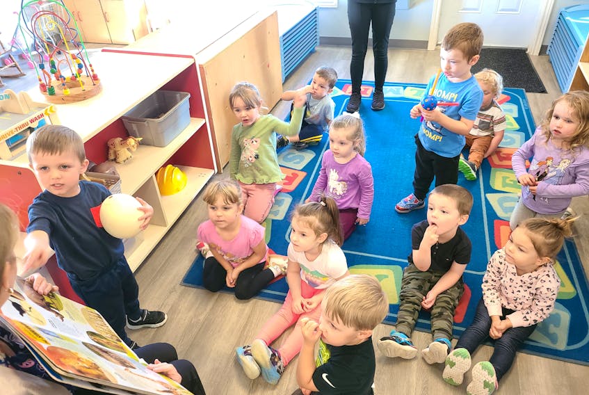 Logan Levangie shows his classmates at Town Daycare a real ostrich egg in this photo from earlier this year. The three-year-old early learners were learning about ostriches that day and their teacher was reading them a book about the birds. The other students are, front row from left, Alexis MacKinnon, Holly Younger, Owen O'Leary, behind them from left, Brielle MacIntosh, Scarlett Rideout, John-Thomas King, Miley Popwell, behind them from left, Ryan Doyle, A.J. Lockman, Lainey MacIntosh and William Coolen is sitting behind Lockman. CONTRIBUTED 