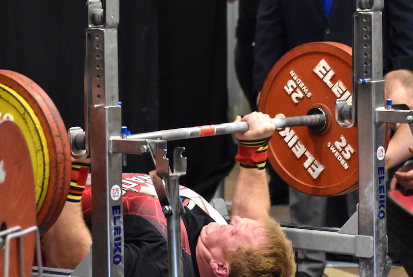 Cape Breton's Mark MacPhail successfully completes a bench press of 352.74 pounds during the Eastern Canadian Powerlifting and Bench Press Championships at Holiday Inn Sydney Waterfront on Friday. JEREMY FRASER • CAPE BRETON POST