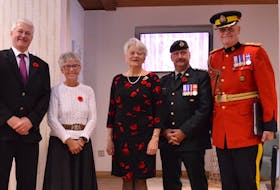 Rotarian Angus Orford, left, welcomes author Katherine Dewar, Lt.-Gov. Antoinette Perry, Capt. Greg Gallant and aide-de-camp Bob Moffat to the Charlottetown Rotary Club's Remembrance Day ceremony Nov. 8.