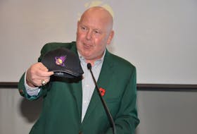 Eastern Canadian Basketball League (ECBL) president Tim Kendrick holds up a Summerside Slam hat during a media conference at Credit Union Place on Nov. 10. Kendrick announced the Slam will begin play in the ECBL in March 2022.