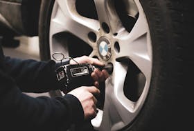 Going straight for a power tool as soon as the wheel is back on can cause big headaches, as you may not feel that a fastener is cross-threaded until it’s too late. Benjamin Brunner photo/Unsplash