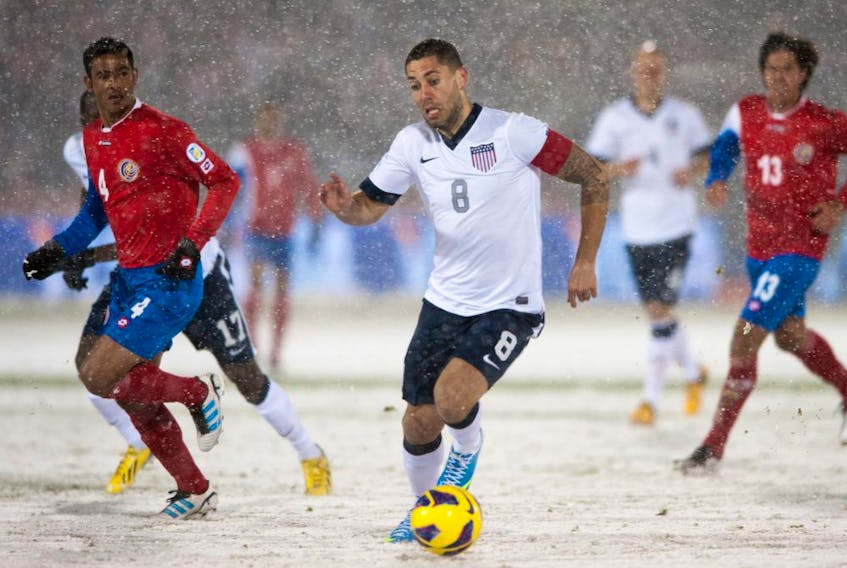 Midfielder Clint Dempsey #8 of the United States dribbles the ball during a FIFA 2014 World Cup Qualifier match between Costa Rica and United States at Dick's Sporting Goods Park on March 22, 2013 in Commerce City, Colorado. 