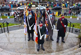 Members of the Royal Canadian Legion colour party at the National War Memorial in downtown St. John's during Thursday's Remembrance Day ceremony. See story on A2. ANDREW WATERMAN • THE TELEGRAM