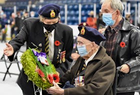 103-year-old Second World War veteran Jim McRae lays a wreath during the Royal Canadian Legion Branch 61 Remembrance Day ceremony at the Yarmouth Mariners Centre. After all wreaths were laid people sang Happy Birthday to McRae, who will turn 104 on Nov. 28. TINA COMEAU PHOTO