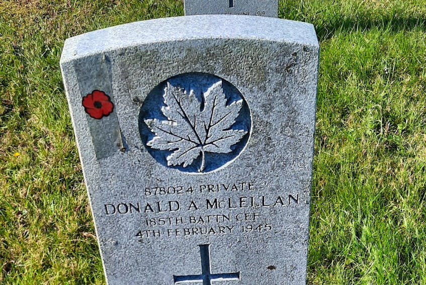 These are two of the many headstones on which Inverness veteran Lauchie MacPhee has placed poppy stickers. Chris Connors • Cape Breton Post