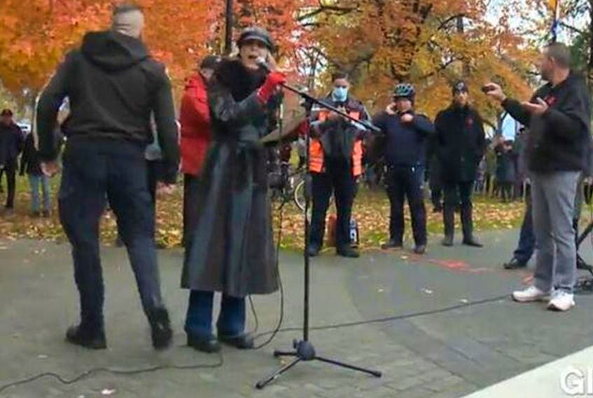 A woman disrupts Remembrance Day ceremonies in Kelowna in footage from Global Okanagan.