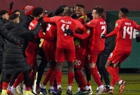 Team Canada celebrates after Jonathan David (20) scored against Team Costa Rica during a FIFA 2022 World Cup qualifier soccer match held at Commonwealth Stadium in Edmonton, Canada on Friday November 12, 2021. Team Canada won the game 1-0. 