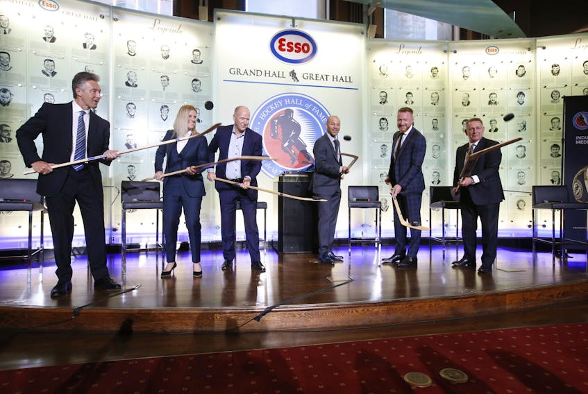 This year's six Hockey Hall of Fame inductees received their rings at a ceremony at the Hockey Hall Grand Hall and in Toronto (From left) Players Doug Wilson, Kim St-Pierre, Kevin Lowe, Jarome Iginla, Marian Hossa and Ken Holland for the Builders Category on Friday November 12, 2021