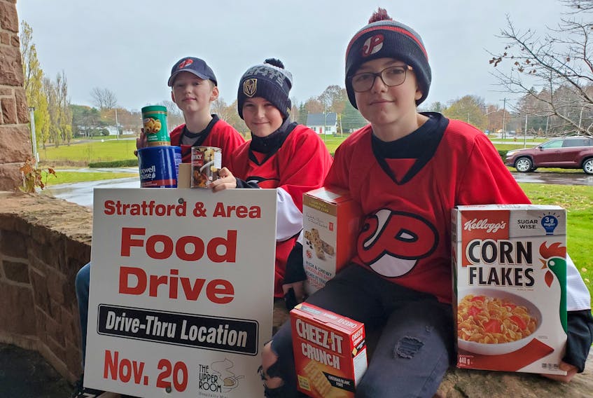 Lucas Schade, left, Jack Griffin and Gavin Landry are members of Team Landry’s Pownal U13 Boys’ Hockey. The team has volunteered to accept donations for the Stratford and Area Food Drive at Sobeys Stratford on Saturday, Nov. 20. 