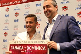 Men's national team head coach John Herdman, left, and Peter Montopoli, Canada Soccer General Secretary announce the Canada v Dominica friendly at the Intercontinental Toronto Centre in Toronto, Ont. on Tuesday July 17, 2018. 
