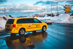 A Jiffy Cab turns onto Newfoundland Drive in St. John's.