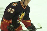  A fresh-faced Dion Phaneuf plays in his first game as a Calgary Flame way back in 2005. Phaneuf scored 20 goals in his rookie season, a feat he never matched again in his 14-year career. LEAH HENNEL/POSTMEDIA FILES