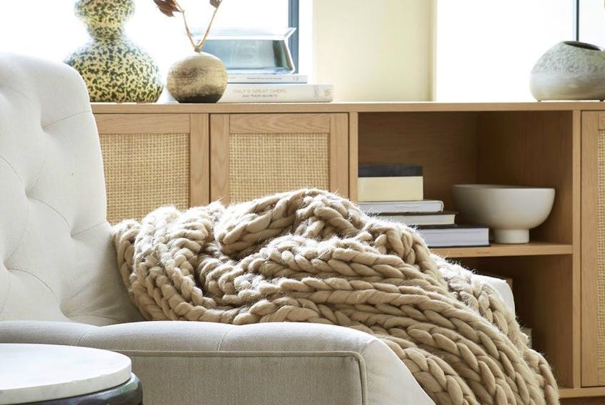 A cosy throw in a neutral colour makes the perfect home-related gift to give. 