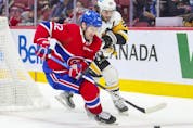 Montreal Canadiens' Jonathan Drouin protects the puck from Pittsburgh Penguins' Kris Letang during third period in Montreal Thursday, Nov. 18, 2021.