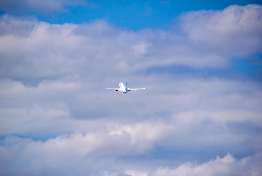 A WestJet aircraft is seen during takeoff.