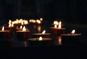 People are asked to bring a candle or light and a food bank donation if they can to the Trans Day of Remembrance event in Sydney this Saturday.  ZORAN KOKANOVIC/UNSPLASH