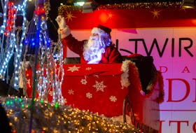 Santa waves to the crowd at the Saltwire Holiday Parade of LIghts on Saturday, Nov. 20, 2021.