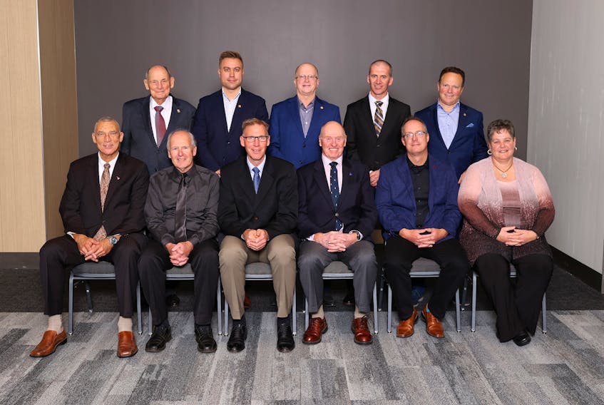 The 2021 Nova Scotia Hall of Fame induction ceremony was Saturday night in Halifax.  The class of 2021 included, front row, from left: Ted Upshaw of Three Mile Plains (athlete, basketball); Robert Putnam of Brookfield (athlete, softball); Todd Hallett of Shelburne (athlete, rowing); Brian Todd of Halifax (builder, sailing); Richard Dalton of Halifax (athlete, paddling) and Cathy Mason of Stellarton (builder, multi-sport). Back row: members of Team Dacey 2004 Brier curling champions, from left, Peter Corkum, Andrew Gibson, Rob Harris, Mark Dacey, Mat Harris (absent, Bruce Lohnes). - NICK PEARCE