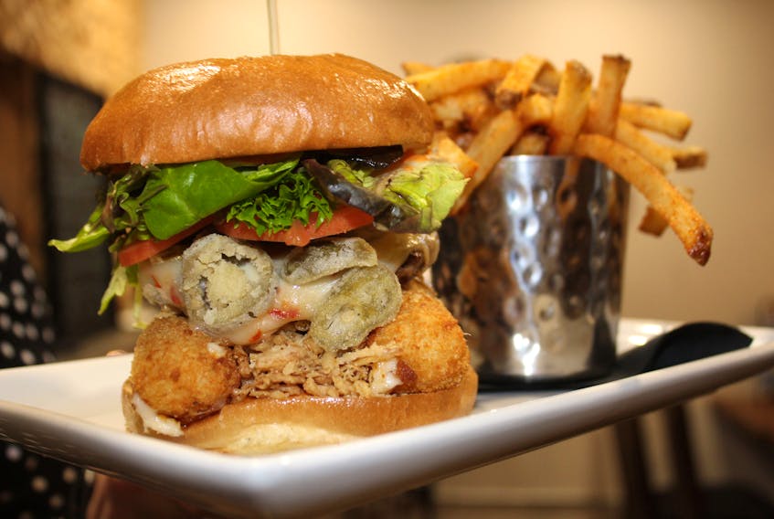 The 7 By 7 special Novem-Burger is crispy chicken with mozza sticks, bacon, Monterey jack cheese, jalapeno peppers and a special gochujang ranch sauce made by the restaurant on Charlotte Street in Sydney. NICOLE SULLIVAN/CAPE BRETON POST 