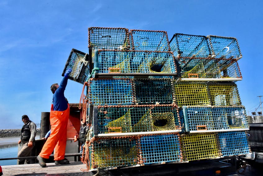 Lobster traps are loaded onto a trailer at the end of the last season in LFA 34. Another season is now getting underway and getting lobsters to the markets – and marketing in general – is a vital part of the industry. TINA COMEAU PHOTO
